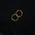 Aretes Candonga Tipo Melcocha en Oro 18K