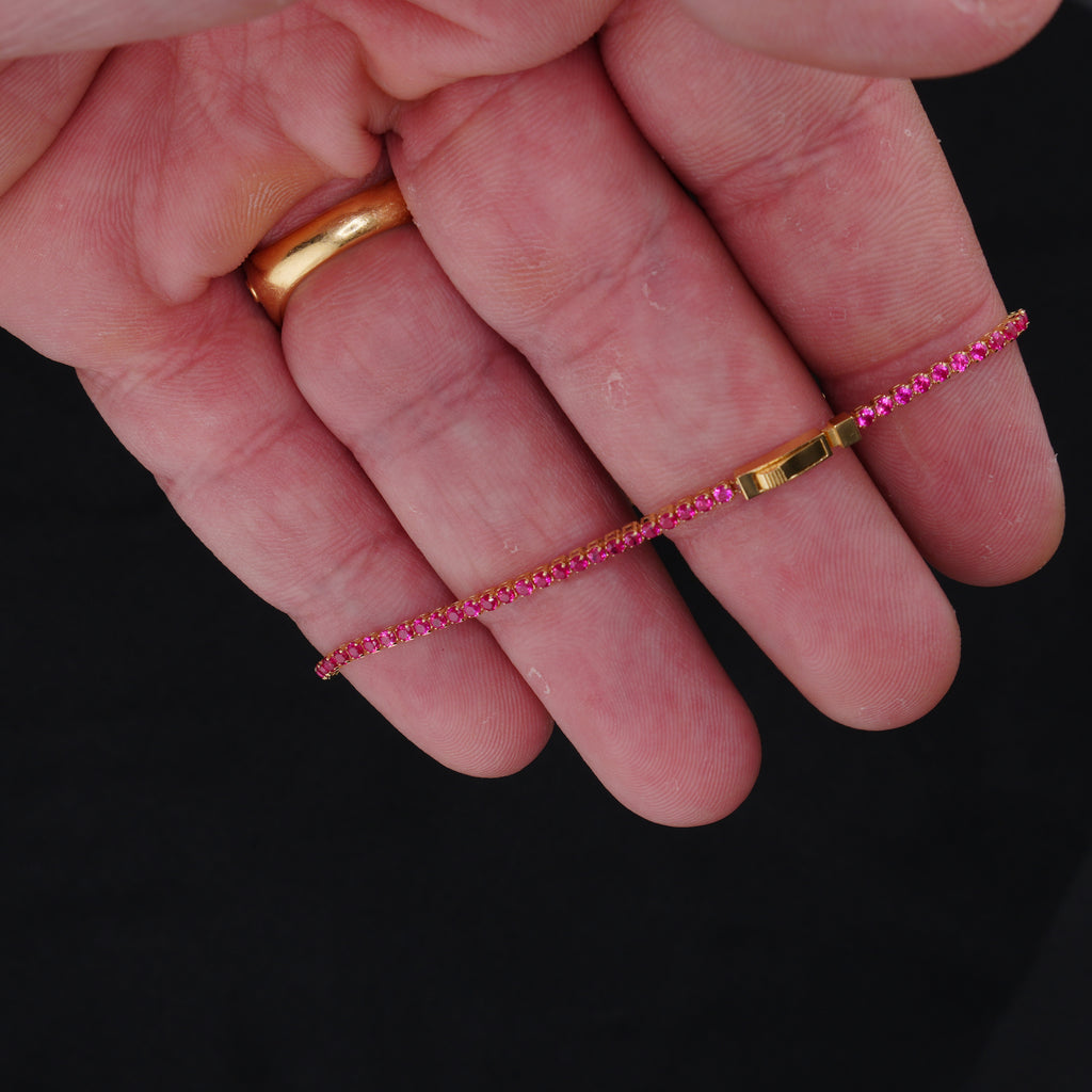Pulsera Sin Fin en Oro 18K con Cristales Swarovski Rojos y Fucsia