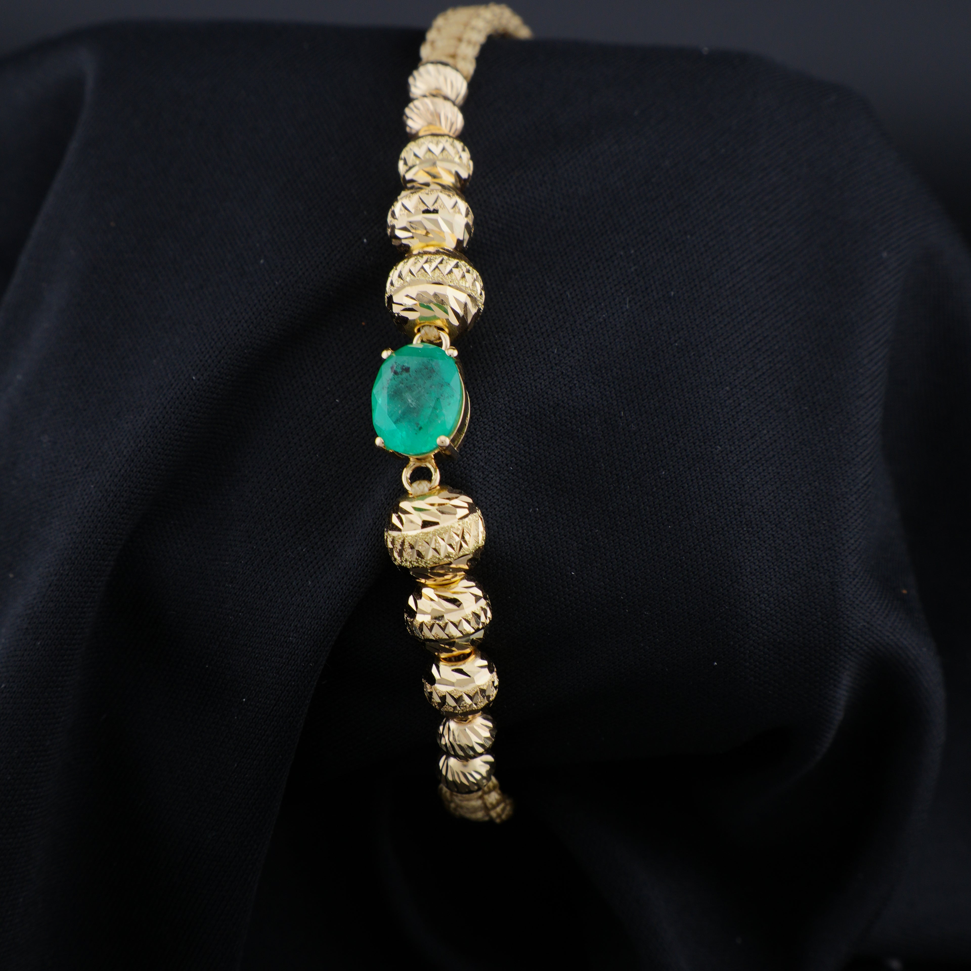 Pulsera Tejida en Oro 18K con Esmeralda Natural de Muzo